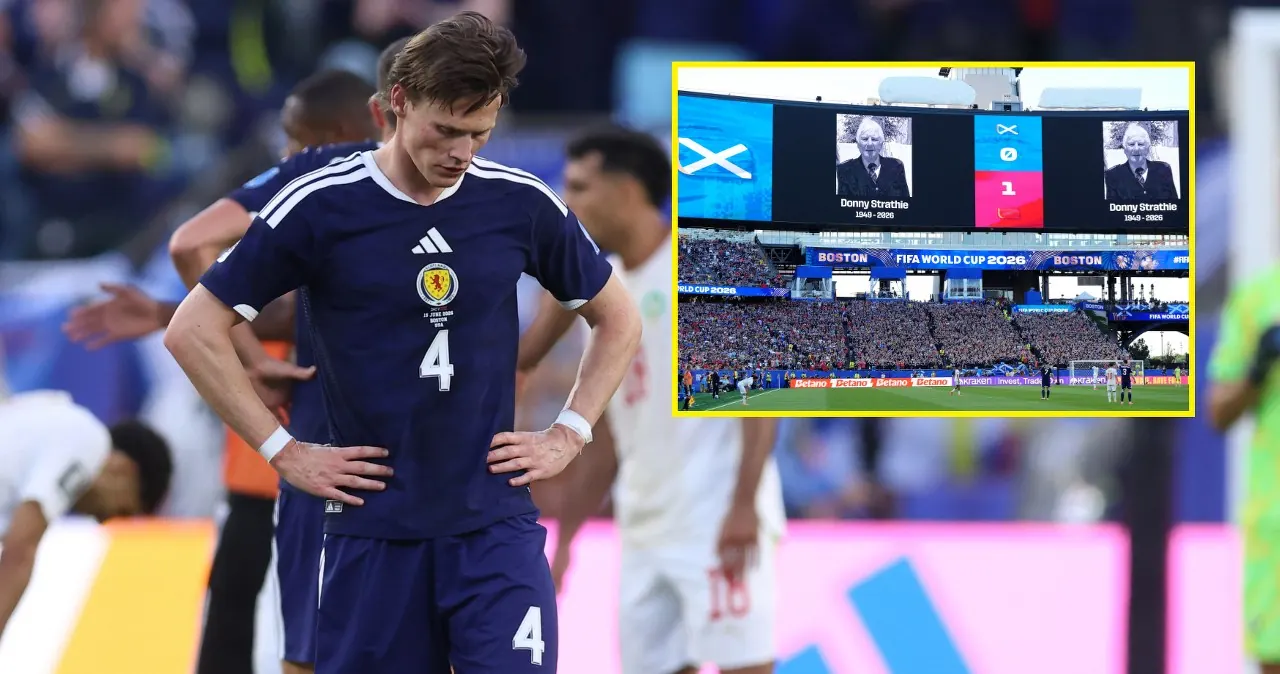 Kibice reprezentacji Szkocji bijący brawo na stadionie podczas meczu Mistrzostw Świata w piłce nożnej.